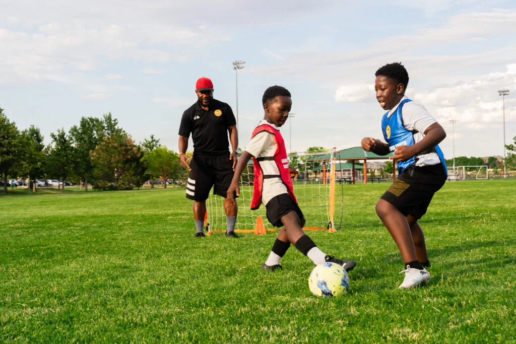Young boys enjoying a soccer game