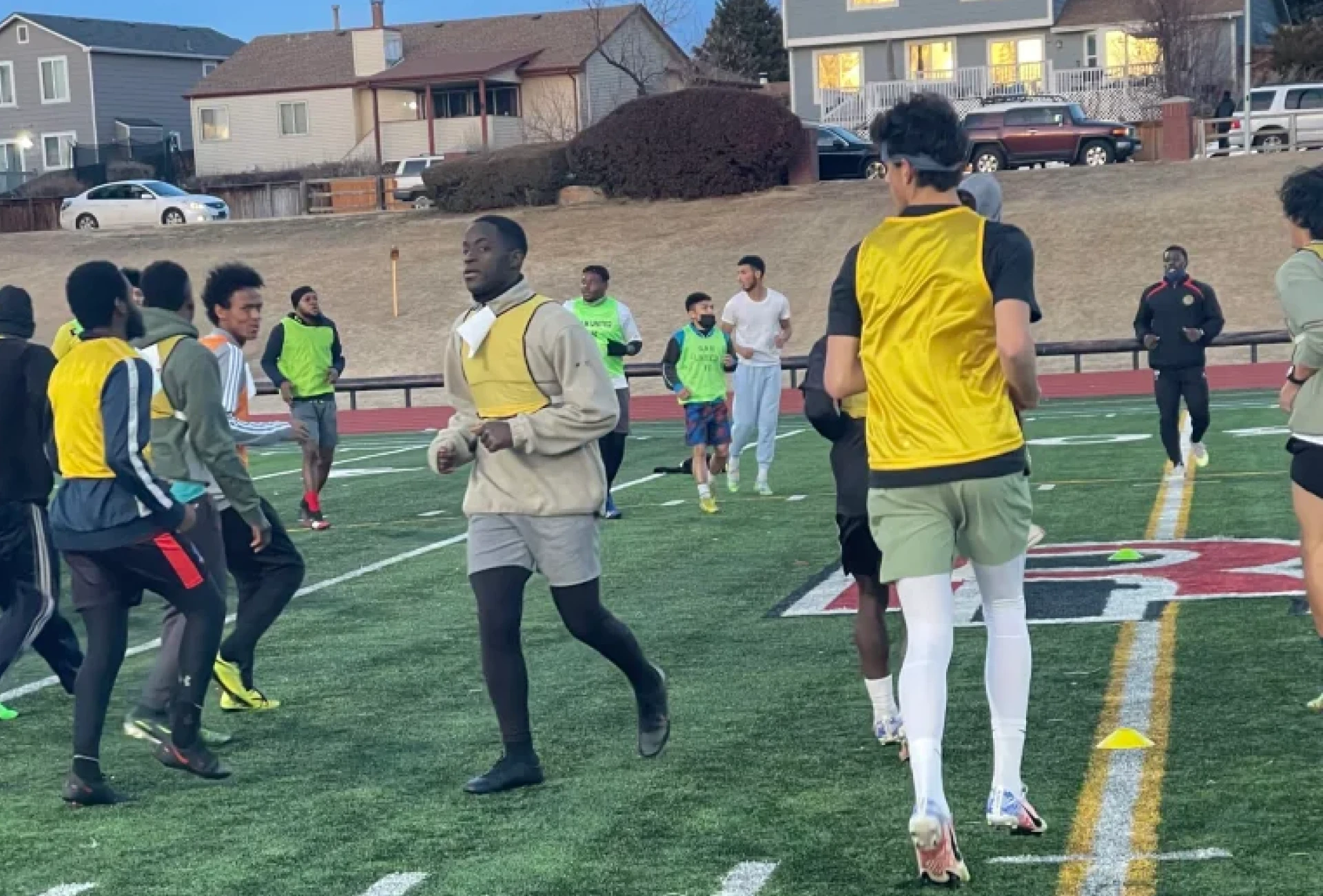 Group practicing soccer drills